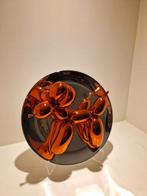 Balloon dog orange, Ophalen