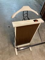 Valet voor kledingstoomboten, Ophalen