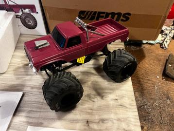 Fms smasher v2 monstertruck met upgrades beschikbaar voor biedingen