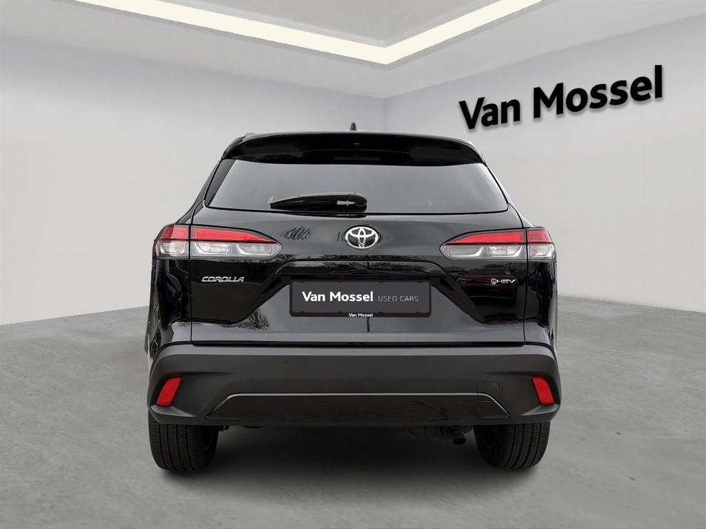 Toyota Corolla Cross 1.8 Hybrid Style, Stof, Gebruikt, 750 kg, Zwart