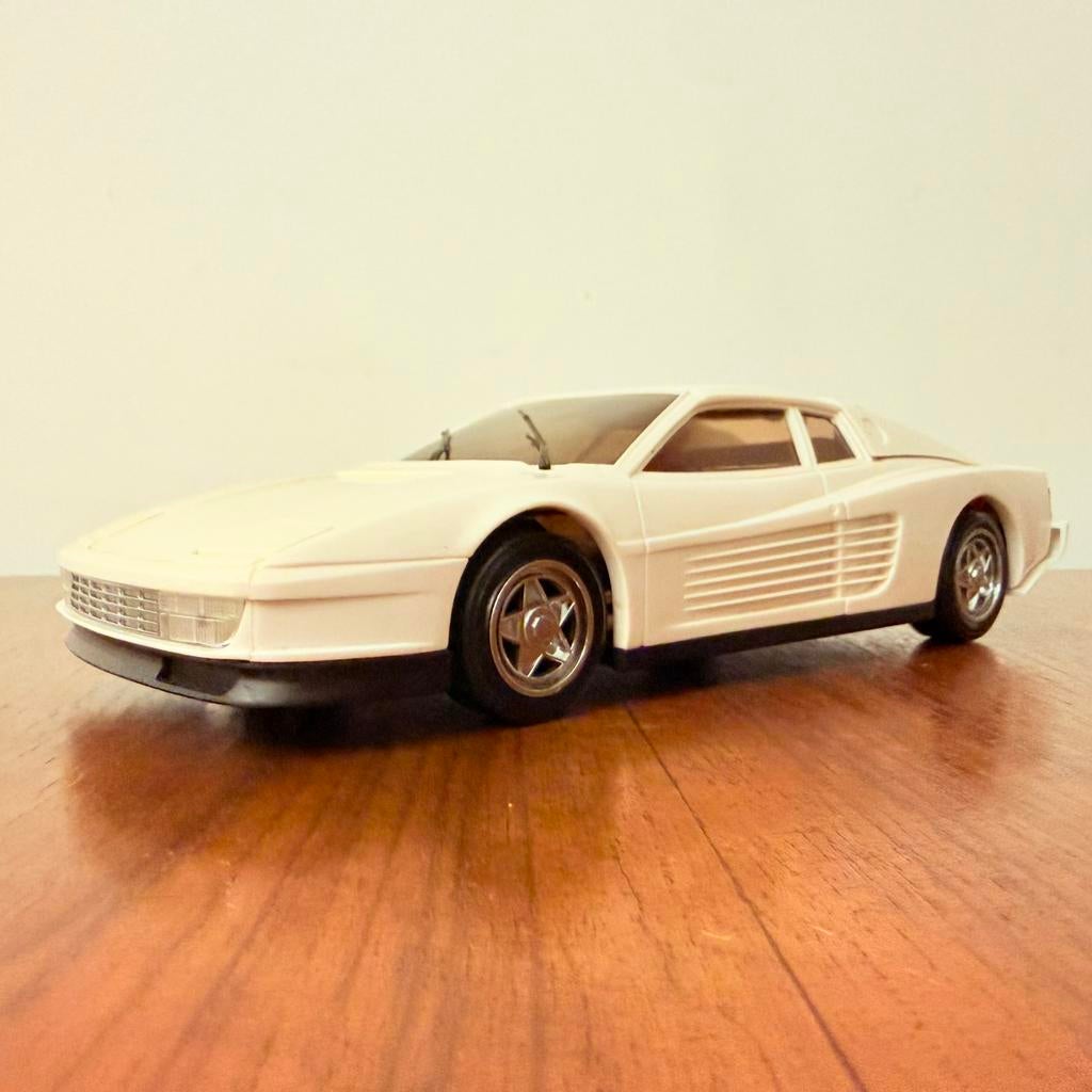 VINTAGE NOVELTY RADIO FERRARI TESTAROSSA 1989 TRANSISTOR, Antiek en Kunst, Verzenden