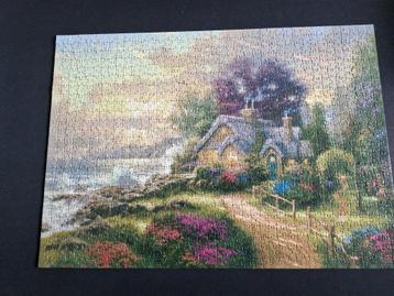 puzzel Schmidt Thomas Kinkade Het huis aan de zee 1000st, Enlèvement ou Envoi, 500 à 1500 pièces, Puzzle