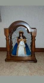 Mooi beeld in houten stulp, Ophalen