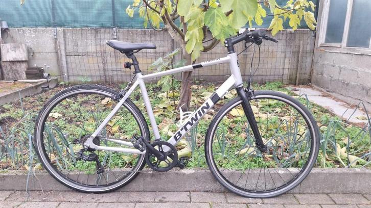 RACEFIETS Btwin Triban 100 FIETS KOERSFIETS MEDIUM LARGE, Fietsen en Brommers, Fietsen | Heren | Sportfietsen en Toerfietsen, Gebruikt