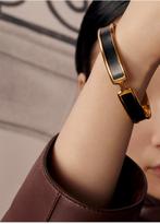 Hermès bracelet noir et or, Handtassen en Accessoires, Horloges | Dames, Ophalen, Zo goed als nieuw, Goud, Goud