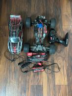 Traxxes rustler 2x4/ nog heel veel onderdelen, Ophalen, Gebruikt