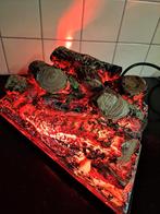 Houtblokken die rood bewegend licht geven, Enlèvement