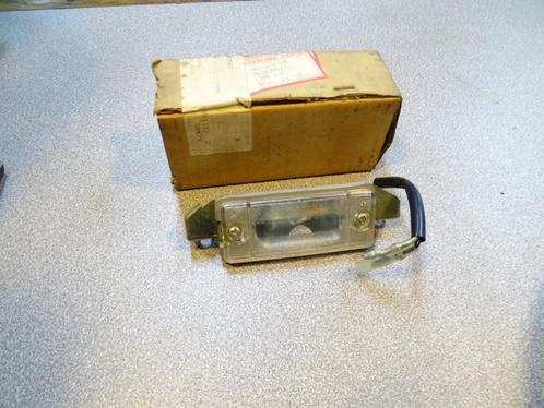nummerplaatverlichting nieuw origineel Mitsubishi Cordia, Auto-onderdelen, Verlichting, Oldtimer onderdelen, Mitsubishi, Ophalen of Verzenden