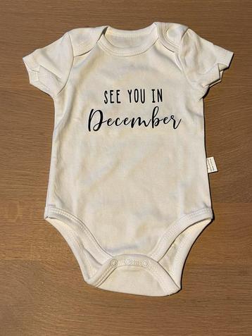 Babyrompertje ‘see you in december’ beschikbaar voor biedingen