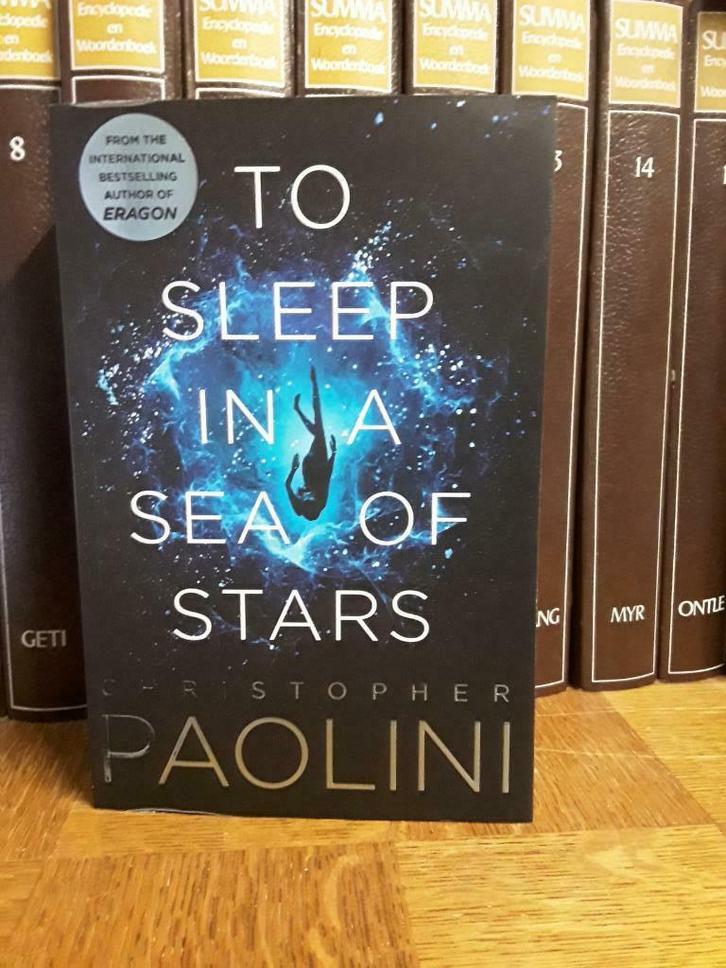 To Sleep in a Sea of Stars, Christopher Paolini,, Boeken, Science fiction, Zo goed als nieuw, Ophalen of Verzenden