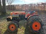 Kubota b7000 met grasbanden, Ophalen