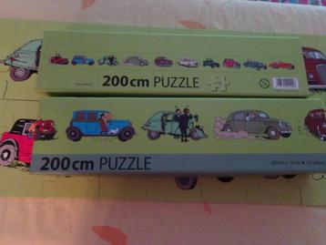 Puzzel van 52 stukjes - Kuifje en de auto's beschikbaar voor biedingen