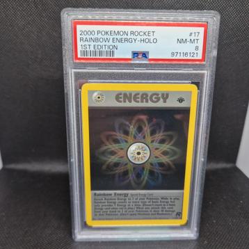 Rainbow Energy Holo 1st Edition Rocket PSA 8 beschikbaar voor biedingen