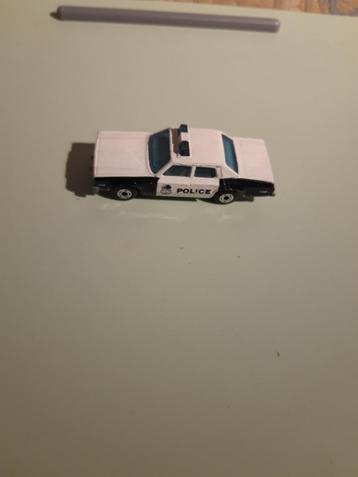 Modelauto Matchbox politieauto Plymouth beschikbaar voor biedingen