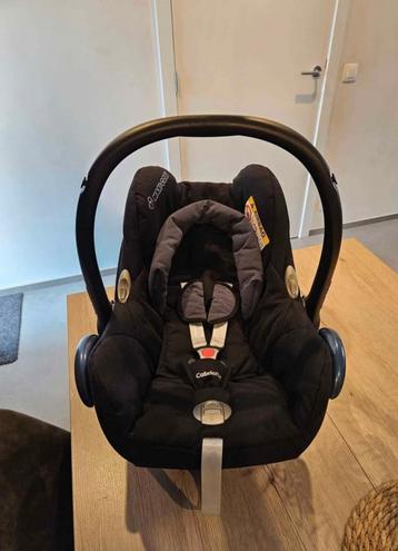 Maxi cosi met regenhoes en muggennet  beschikbaar voor biedingen