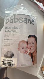 Witte klaboe voor maxicosy, Ophalen