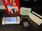 Nintendo Switch OLED Wit ( met accessoires ) - zonder games, Games en Spelcomputers, Spelcomputers | Nintendo Switch, Ophalen of Verzenden