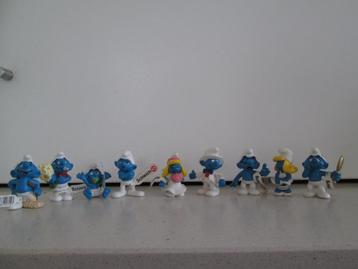 Smurfen; 9 verschillende , ongebruikte smurfen, gelabeld beschikbaar voor biedingen