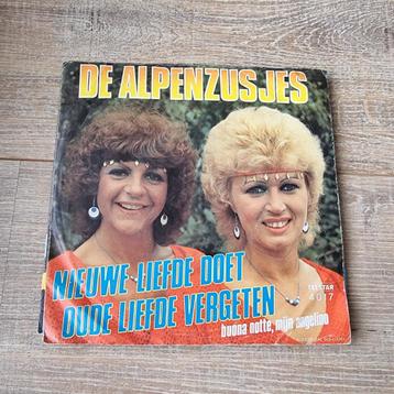 7" De Alpenzusjes – Nieuwe Liefde Doet Oude Liefde Vergeten beschikbaar voor biedingen
