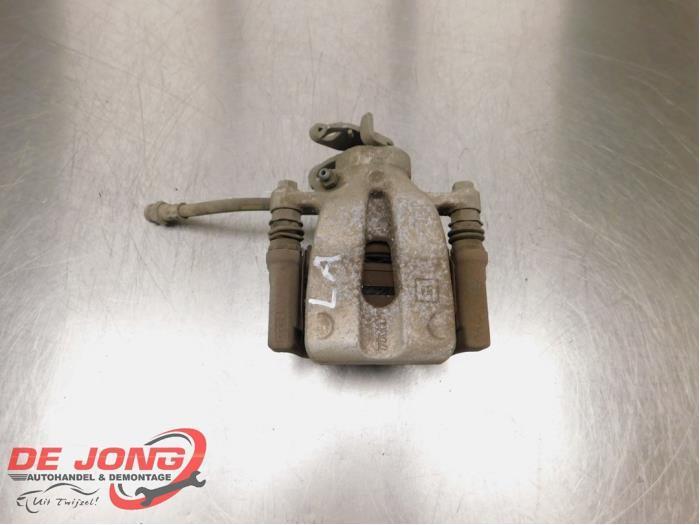 Etrier de frein (pince) arrière gauche d'un Opel Corsa, Autos : Pièces & Accessoires, Freins & Transmission, Opel, Utilisé, 3 mois de garantie