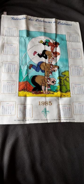 essuie calendrier 1985 - 75è anniversaire - thème BD