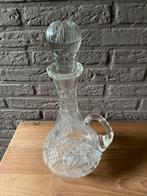 Karaf in kristal, Ophalen