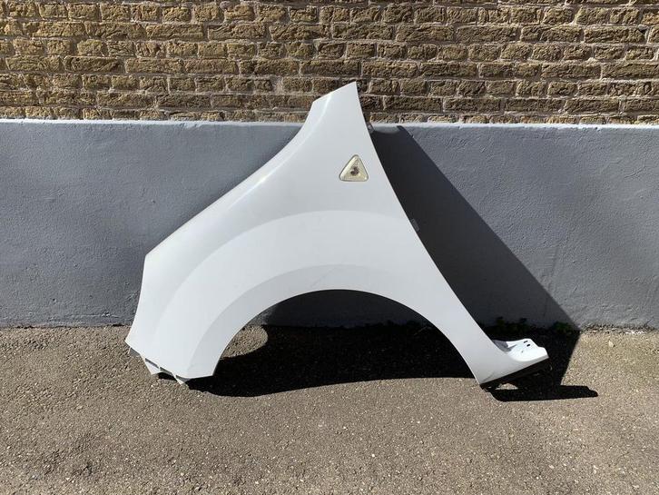 spatbord links renault kangoo 2008 tot 2013 ( FW ) wit, Auto-onderdelen, Carrosserie, Spatbord, Renault, Gebruikt, Ophalen of Verzenden