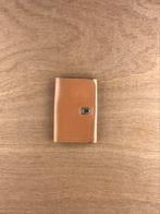 Delvaux sleutelhanger portemonee, Overige merken, Beige, Nieuw, Ophalen of Verzenden