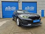 BMW 1 Serie 118 5-deurs 118i Advantage (bj 2023, automaat), Auto's, Stof, Gebruikt, 136 pk, Zwart