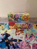 Pokemon prismatic evolutions mini tin display (zonder seal), Enlèvement, Comme neuf, Booster box, Foil