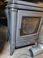 Poele a mazout en fonte sur diac.