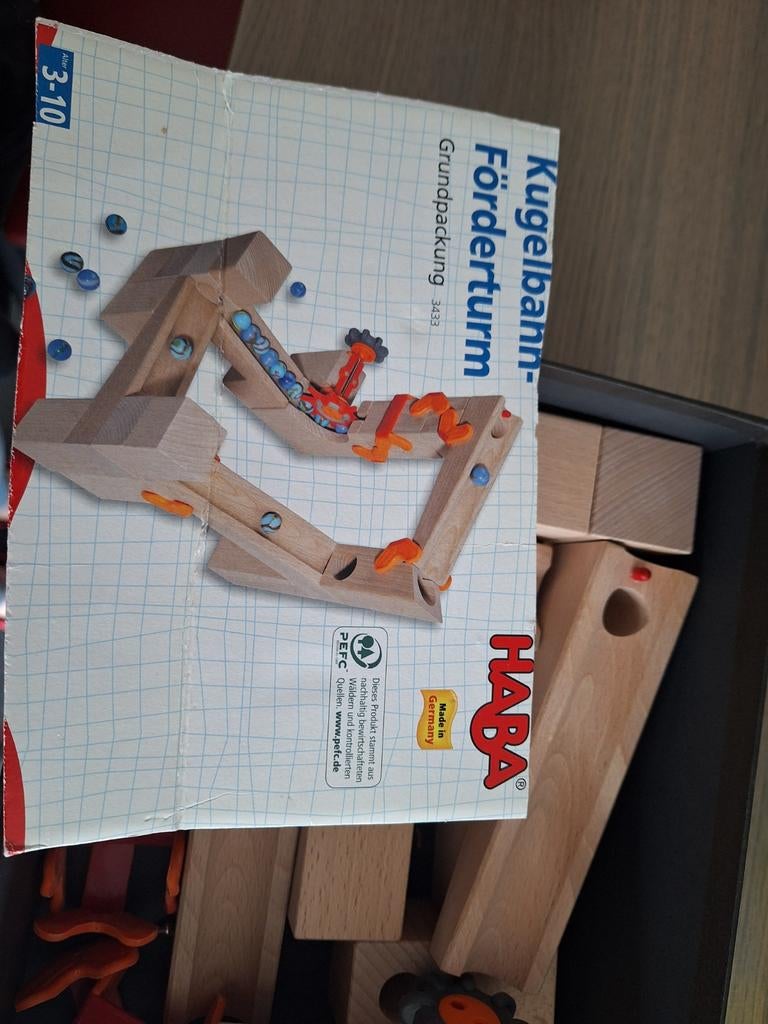 Haba knikkerbaan, Ophalen