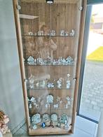 Vitrine kast met beeldjes, Ophalen