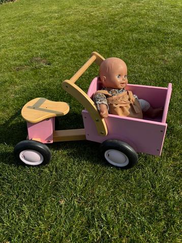 Poppenwagentje en fiets ineen beschikbaar voor biedingen