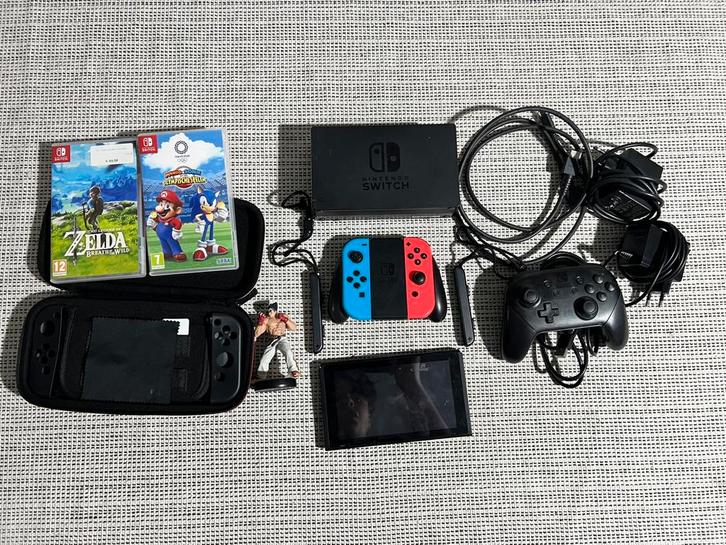 Nintendo Switch met extras, Games en Spelcomputers, Spelcomputers | Nintendo Switch, Zo goed als nieuw, Switch Original, Met 3 controllers of meer