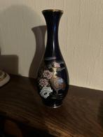 Vintage zwarte vaas, Enlèvement