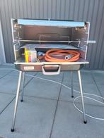 Campingvuur op gas, met 2 pitten en een grill met  motor., Ophalen, Zo goed als nieuw