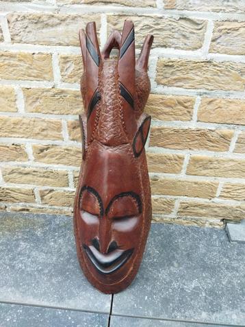 Afrikaans masker, hoogte 65 cm breedte 23 cm beschikbaar voor biedingen