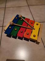 Houten xylofoon., Ophalen