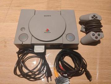 Playstation 1 + controller + memory card + 1 spel beschikbaar voor biedingen
