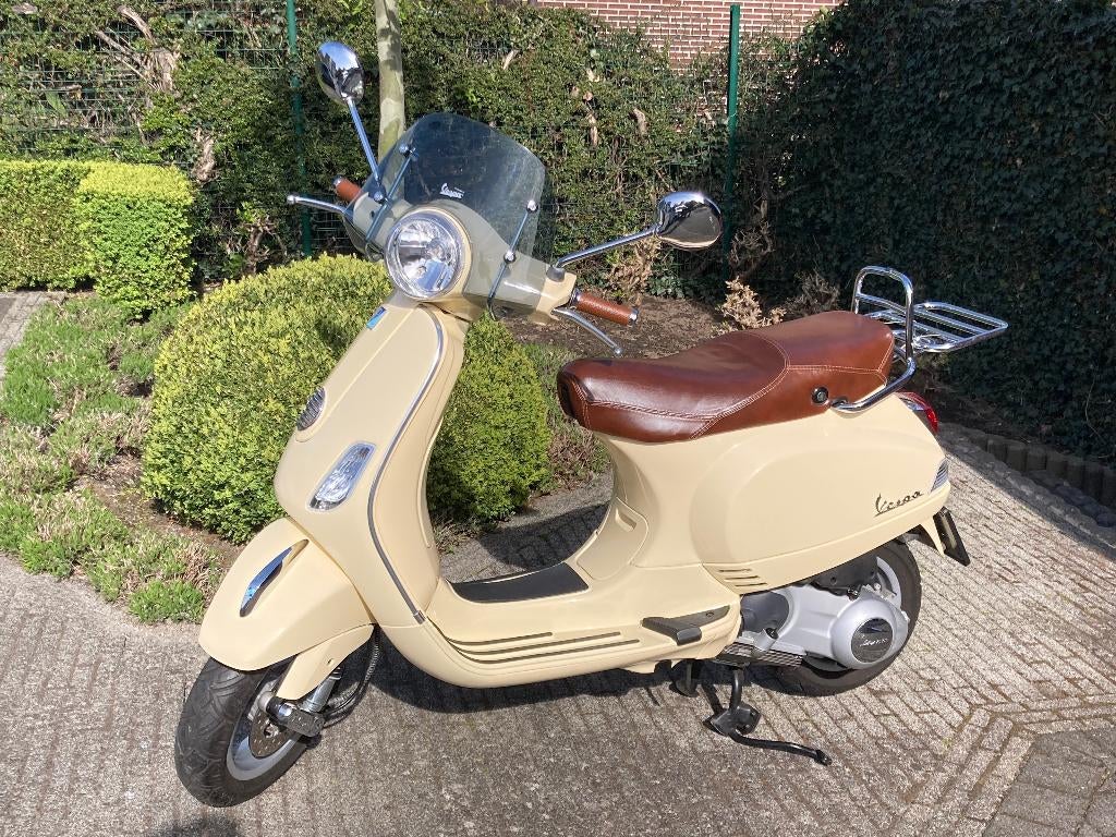 Vespa LX125  125cc, Fietsen en Brommers, Ophalen, 125 cc, Zo goed als nieuw, Benzine