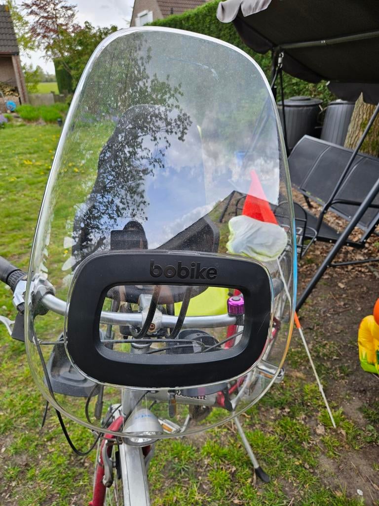 Fietszitje bobike met windscherm, Ophalen