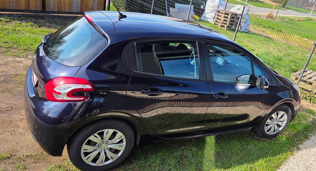 peugeot 208 1.2 benzine bouwjaar 2013, Auto's, Euro 5, Stof, Zwart, Blauw