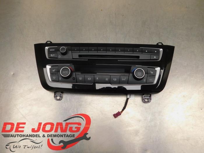 Panneau commande radio d'un BMW 3-Serie, Autos : Pièces & Accessoires, Tableau de bord & Interrupteurs, BMW, Utilisé, 3 mois de garantie