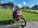 HONDA  CRF 70 in nieuwstaat, Fietsen en Brommers, Brommers | Crossbrommers, Ophalen of Verzenden, Zo goed als nieuw, Honda