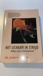 Boek - Het lichaam in strijd - Alles over immuniteit, Ophalen, Gelezen, Dr. John M. Dwyer