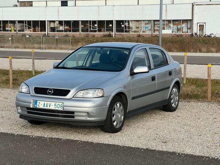 Opel Astra 1.2 benzine 94.000km, Autos, Opel, Entreprise, Achat, Astra, Essence, Boîte manuelle, Argent ou Gris, Noir, Traction avant