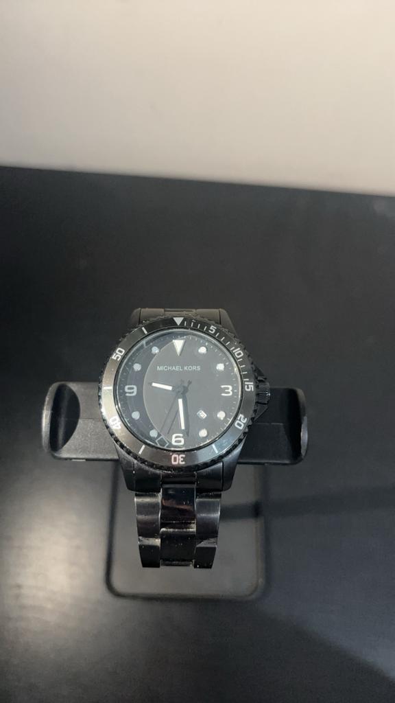 Montre Michael Kors noir, Handtassen en Accessoires, Sporthorloges, Zo goed als nieuw, Zwart, Conditie, Ophalen of Verzenden