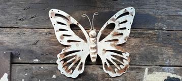Une décoration extérieure papillon beschikbaar voor biedingen