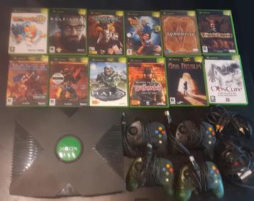 Console Xbox + 39 jeux et 4 manettes